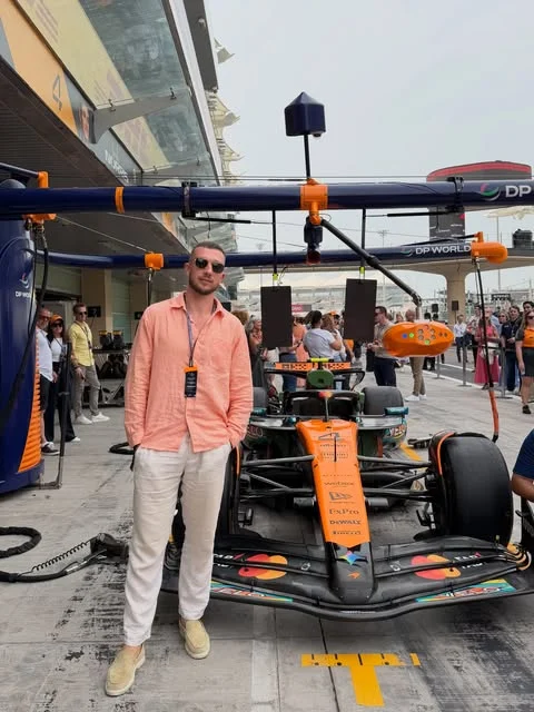 Pablo BeFirst in the Formula 1 pit lane next to the McLaren car