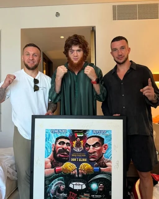 Pablo BeFirst during UFC 308 fight week with a signed fight poster